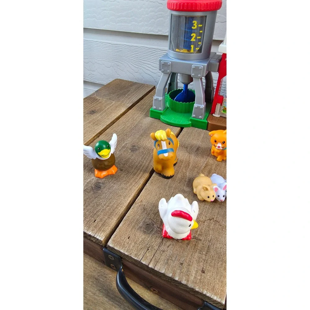 Fisher-Price Little People Caring for Animals Farm Playset with Figures GHT22